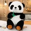 Bamboo-Holding Panda Stuffed Toy